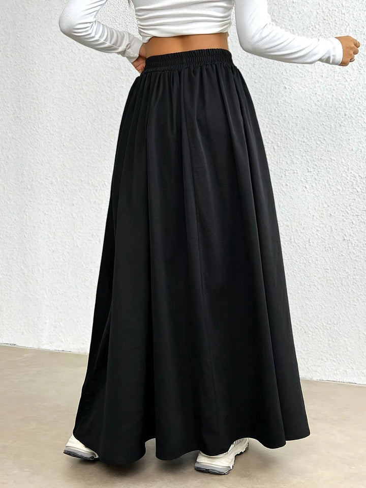 Black Women's High-Waist Flowing Black Maxi Skirt — Emerald Elastic Waist A-Line - Back Detail