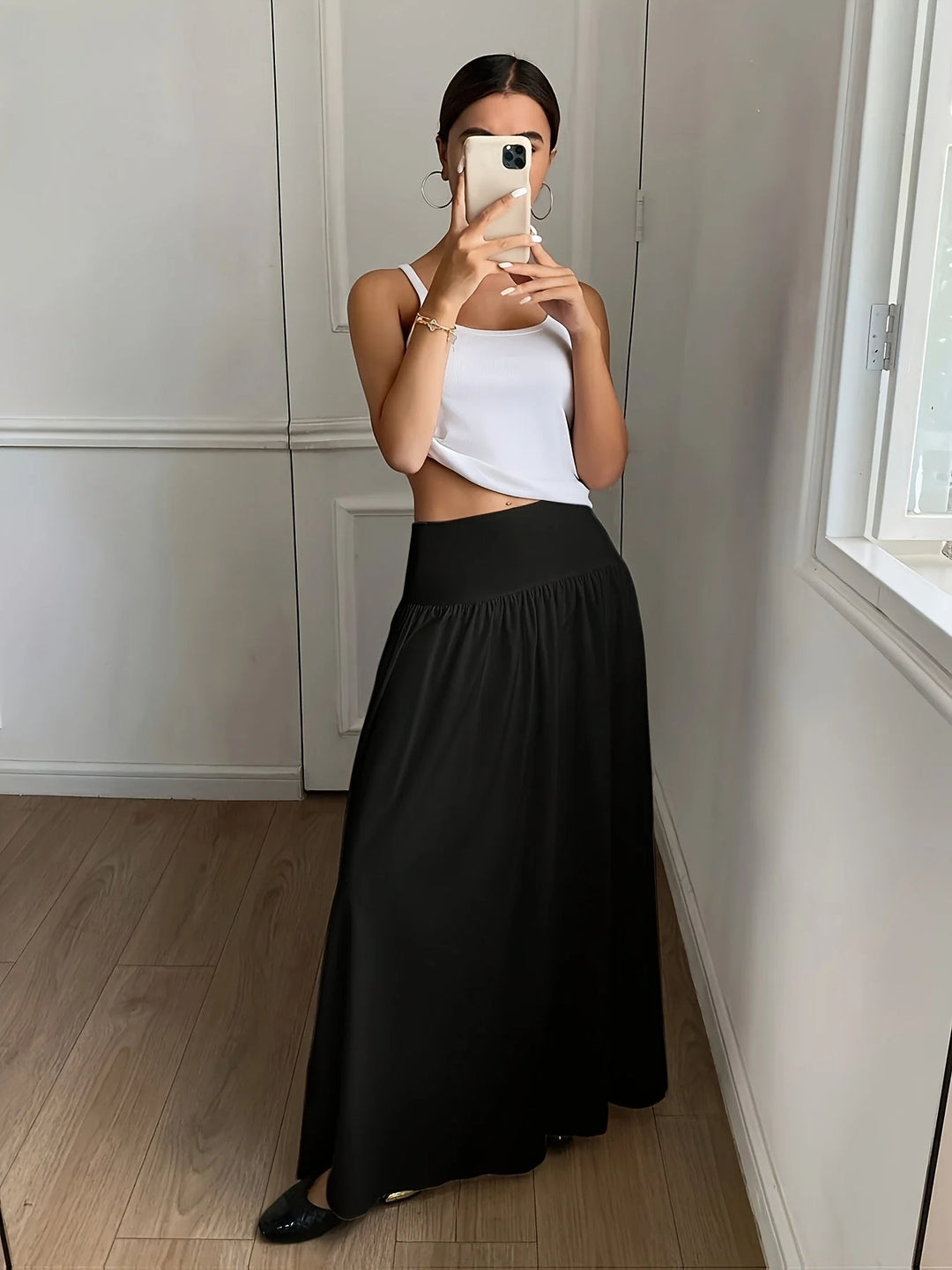 Black Women's High-Waist Flowing Maxi Skirt — Mira Black Tiered Elegant - Mirror Selfie