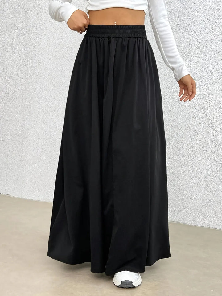 Black Women's High-Waist Flowing Black Maxi Skirt — Emerald Elastic Waist A-Line - Waistband Detail