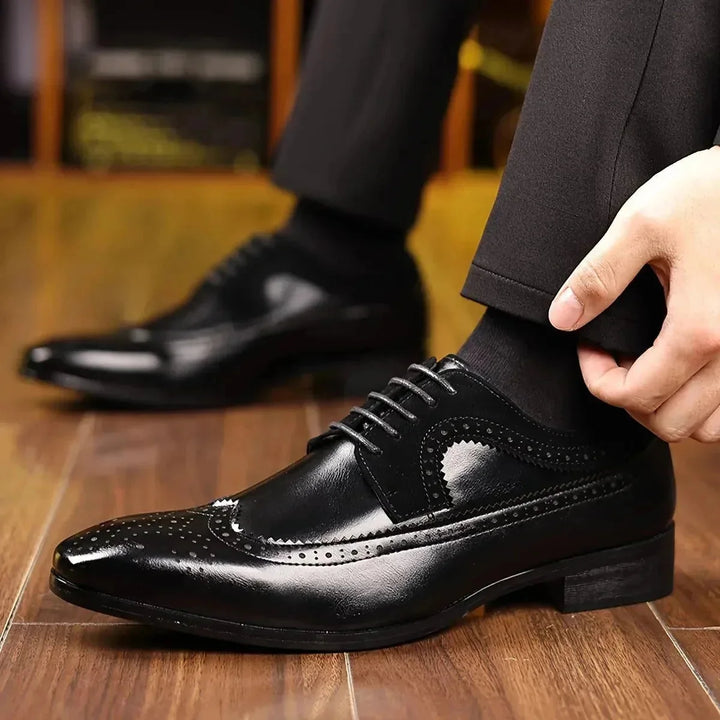 Black Men's Leather Oxford Dress Shoes — Thomas Brogue Wingtip - Worn Formal Pose