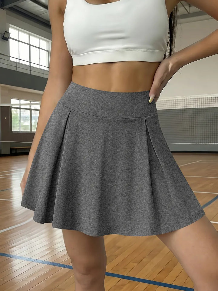 Grey Women's Pleated High-Waist White Mini Skirt — Gloria Athletic Tennis - Studio Angle
