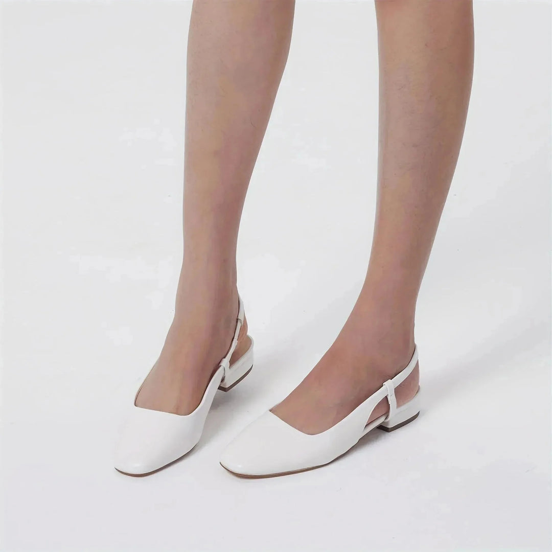 White Women's Square Toe Slingback Flats — Zora Patent Leather Low Block - Model Legs