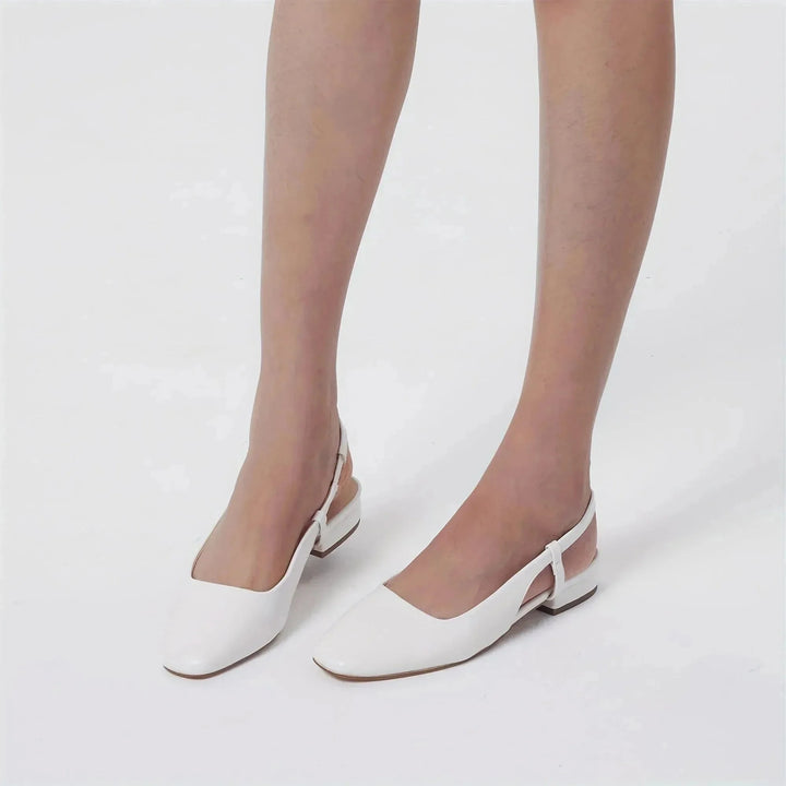 White Women's Square Toe Slingback Flats — Zora Patent Leather Low Block - Model Legs