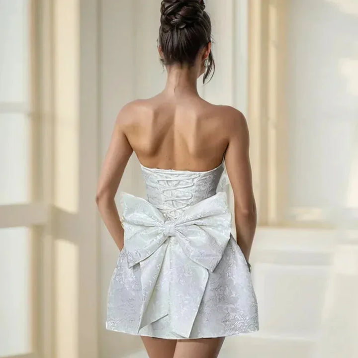 Iris | Elegant Backless Mini Dress with Bow Detail