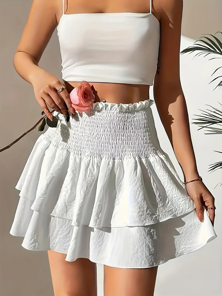 White Women's Tiered Smocked White Mini Skirt — Nala Ruffle High-Waisted - Front Pose